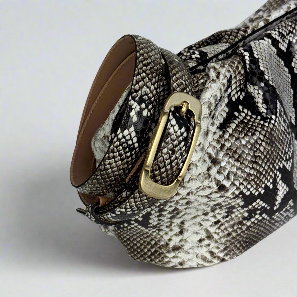 Jacky Clutch in python printed leather with matching thin belt