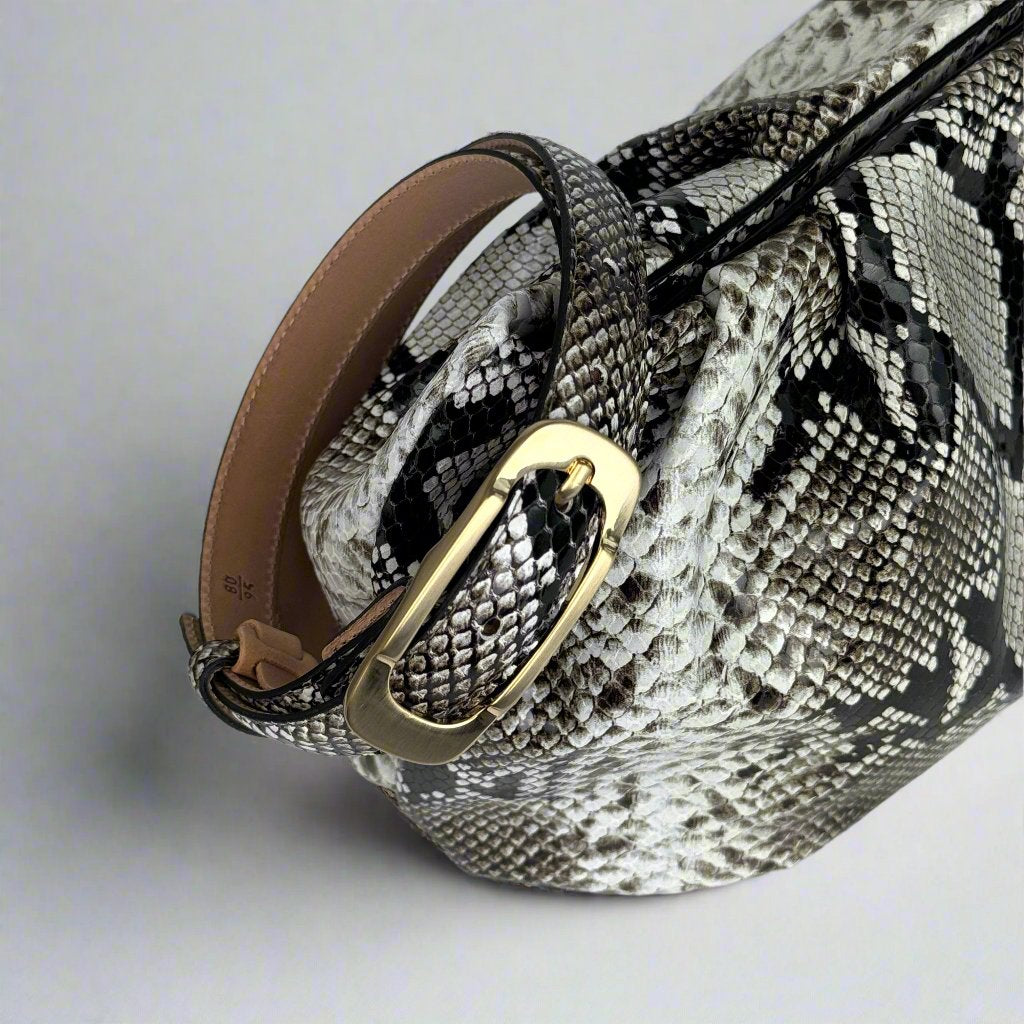 Michelle belt and matching Jacky Maxi clutch in python printed leather