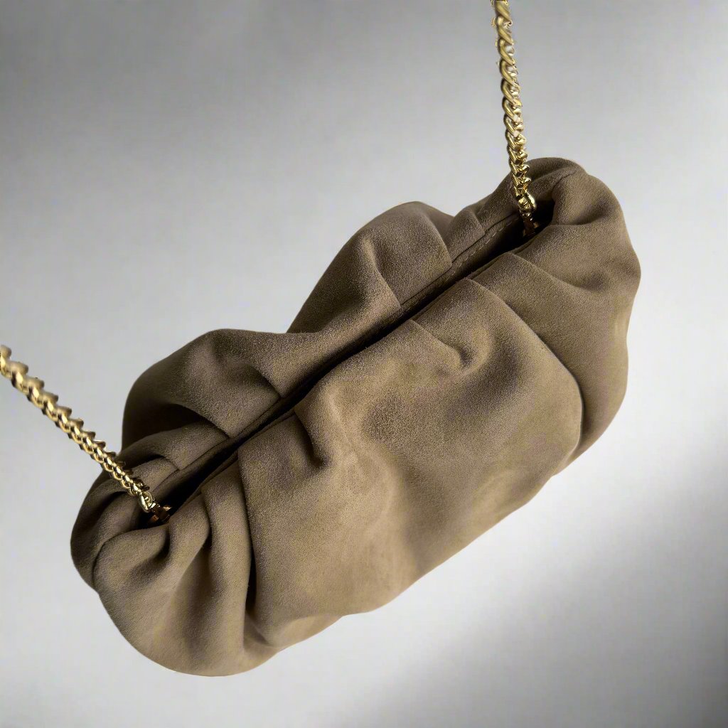 The Jacky Clutch sandbeige suede with gold strap