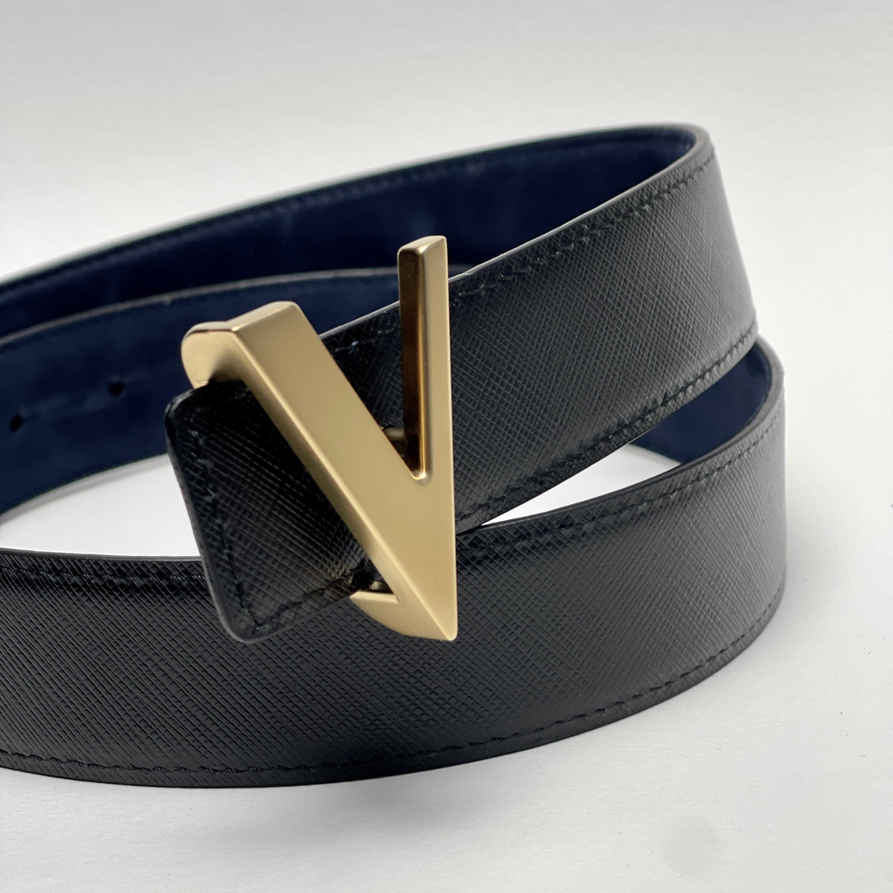 gold brushed buckle with reversible blue and black Italian leather belt strap