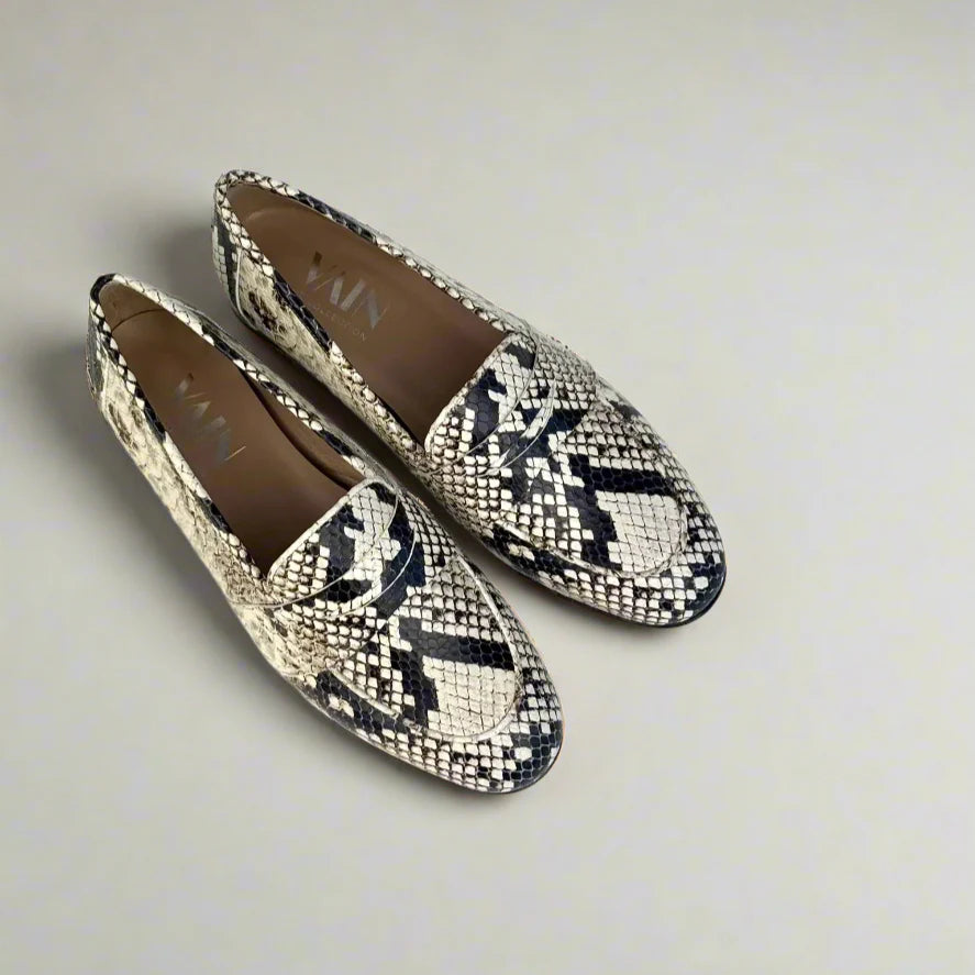 top view of faux python women&