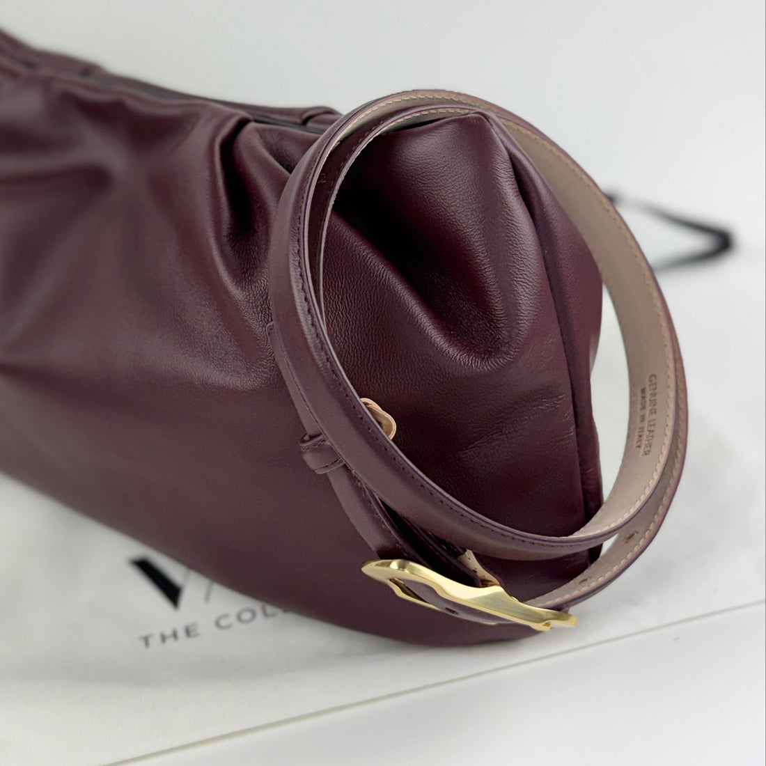 Burgundy belt and matching leather large clutch