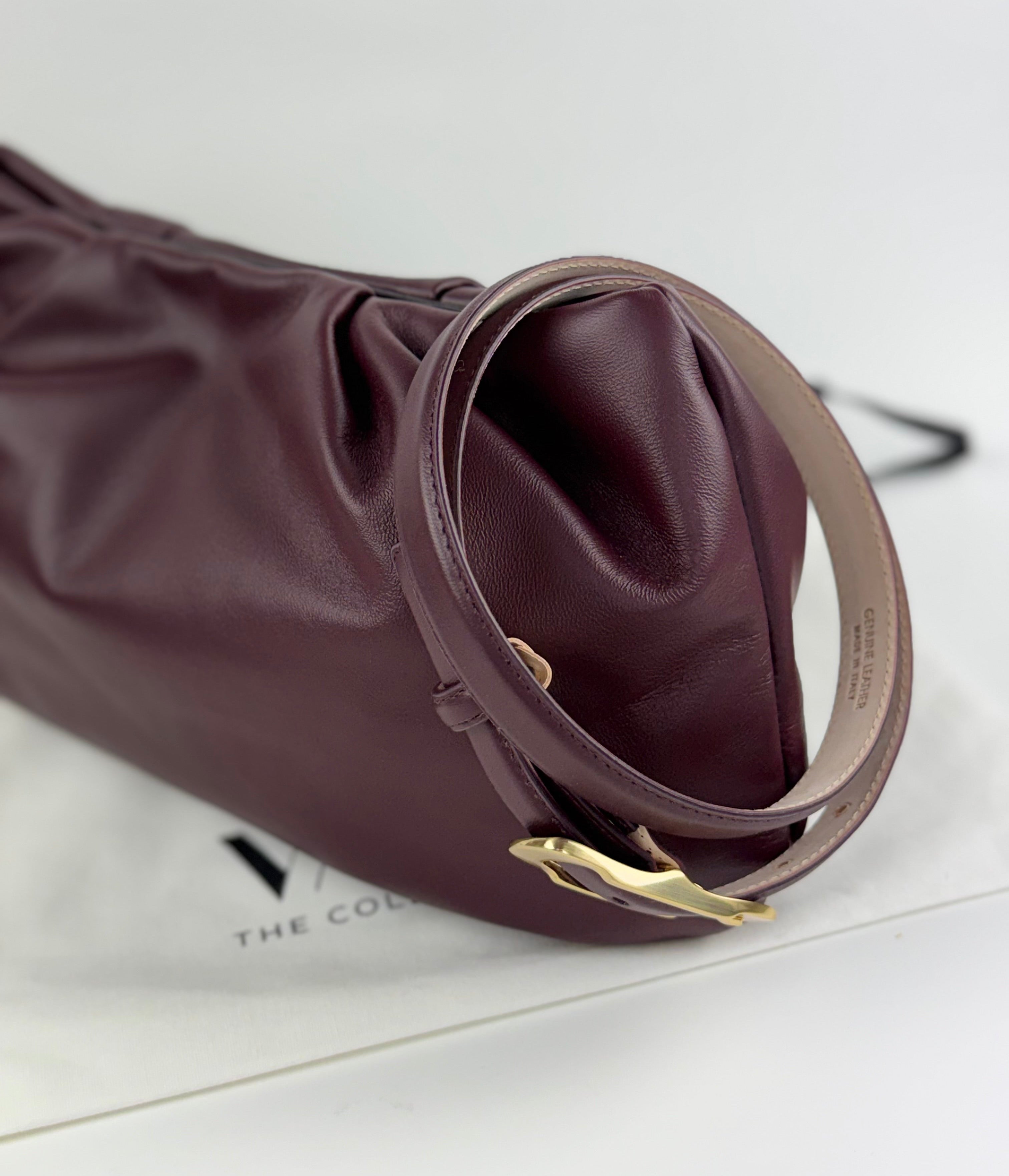 Burgundy belt and matching leather large clutch