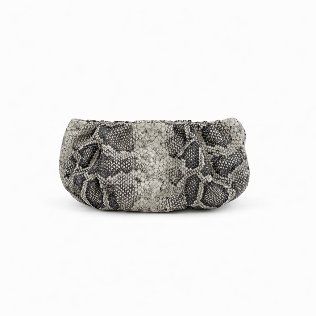 Faux Python-patterned clutch bag on a white background