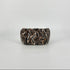 A small clutch bag with a brown and black snakeskin pattern, photographed against a neutral light gray background.