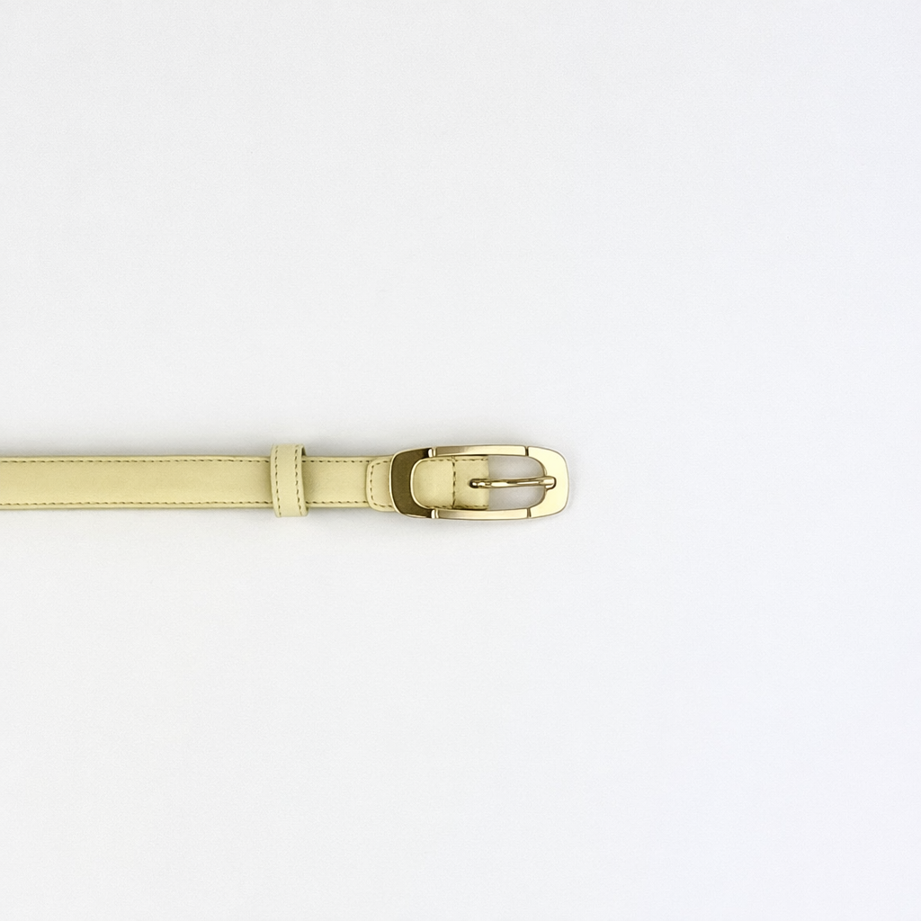 Lemon Yellow leather belt with a gold buckle on a white background