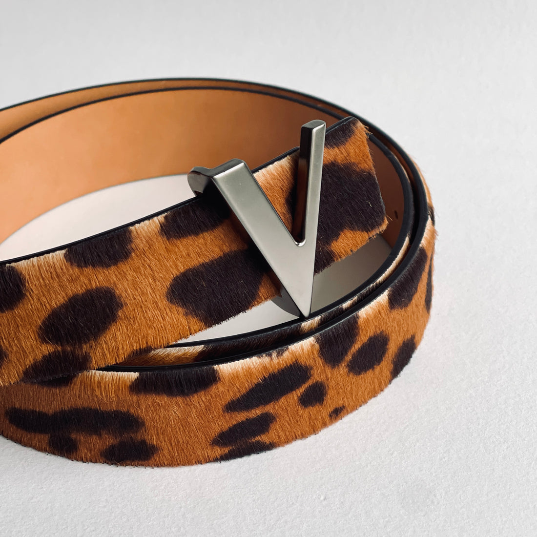 Leopard printed leather belt with dark silver brushed buckle