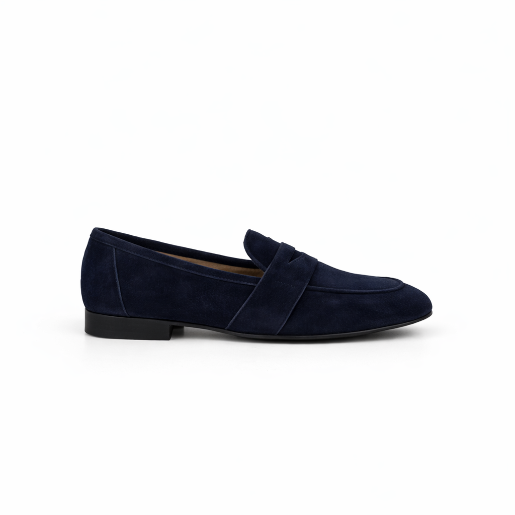 Midnight blue loafer shoe for women on a white background