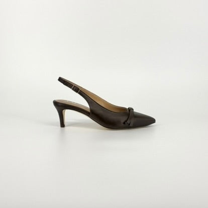 A single dark brown leather slingback pump with a pointed toe and a small decorative bow on the instep, shown from a side profile against a clean white studio background.