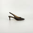 A single dark brown leather slingback pump with a pointed toe and a small decorative bow on the instep, shown from a side profile against a clean white studio background.