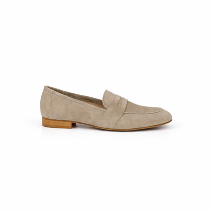 Sandbeige loafer for women with on a white background