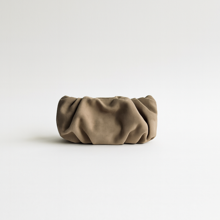 Sandbeige mini clutch on a white background