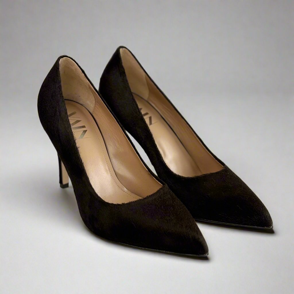 side view on dark brown pony leather high heels