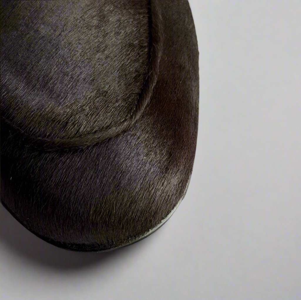 detail of dark brown hair loafer